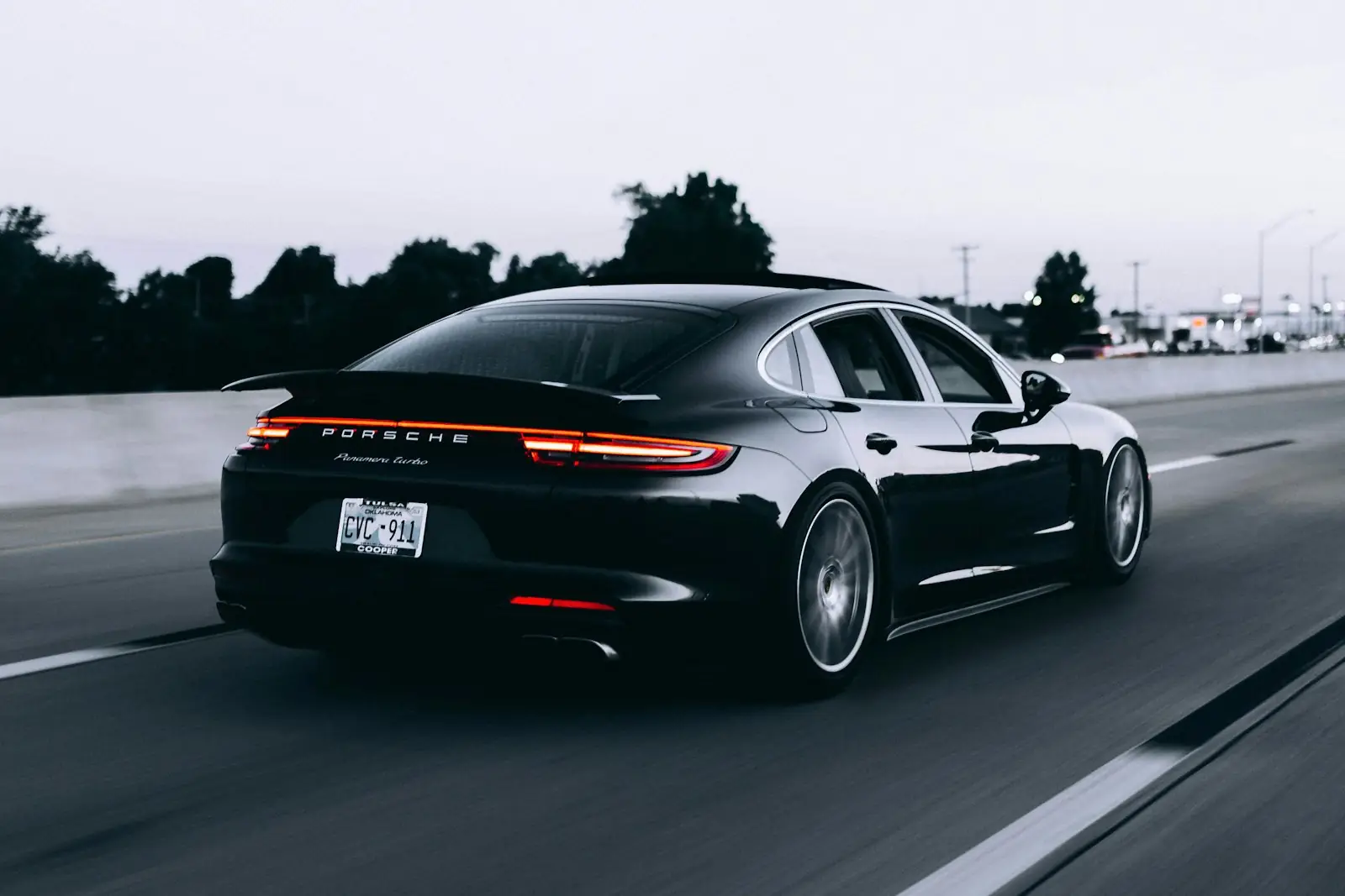 Car driving on a highway, representing VahanDetail vehicle information services